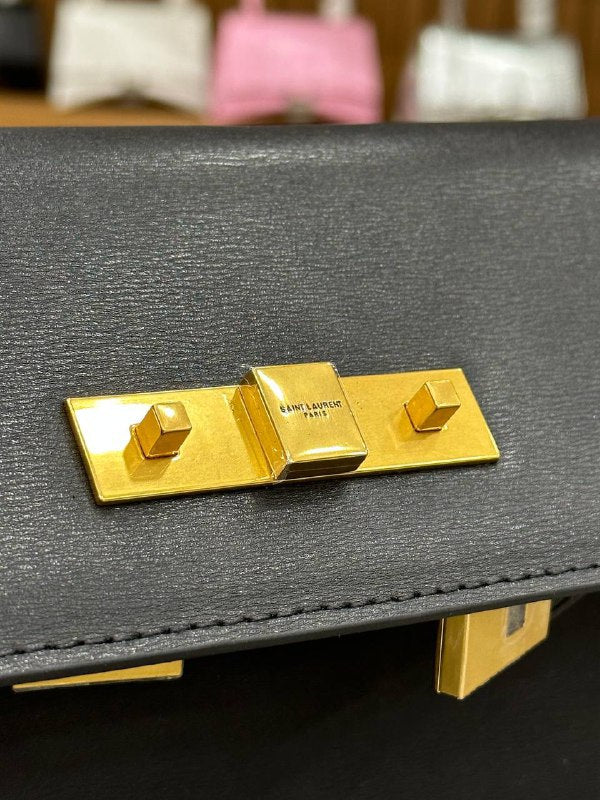 YVES SAINT LAURENT-MANHATTAN CLUTCH